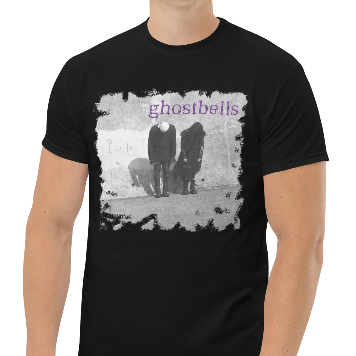 Person wearing a black t-shirt with 'ghostbells' graphic design on a white background